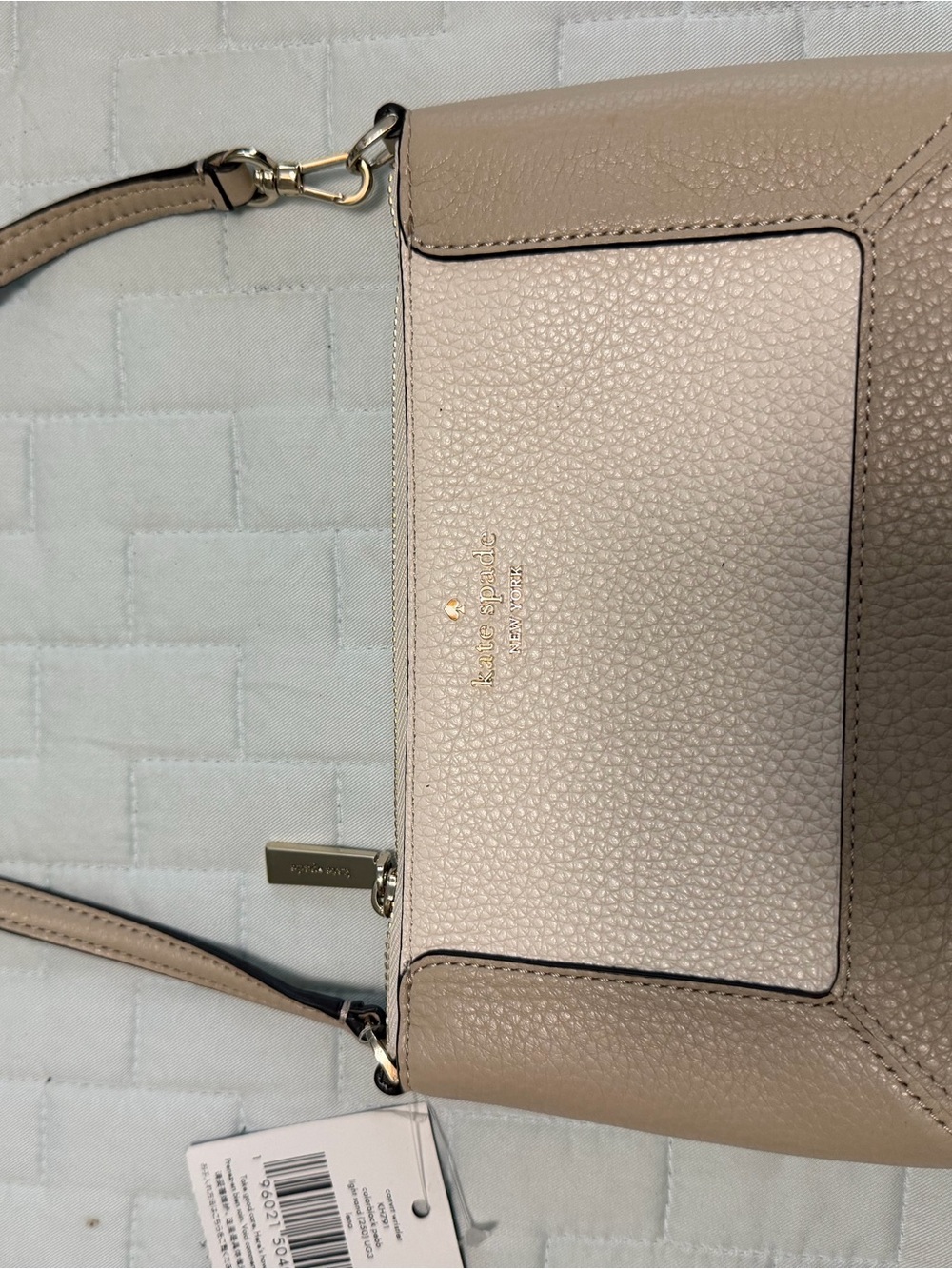 kate spade Two-Tone Pebbled Leather wristlet in Taupe and Cream